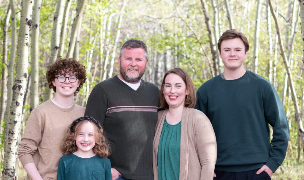 Colin Langenberger candidate running for mayor of Okotoks, 2025, with his family